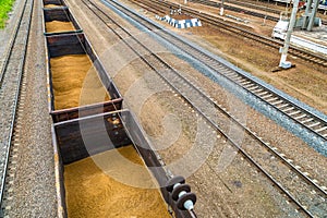 Railway wagons loaded with sand.