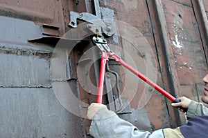 Railway worker bites thick wire