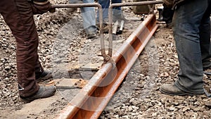 Railway workers bolting track rail