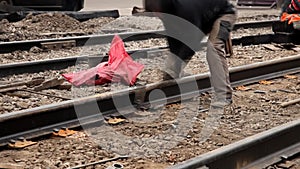 Railway workers bolting track rail