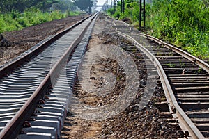 Railway Workers repairing railway on hot summer day