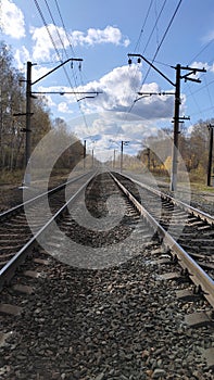 Railways and blue sky with clouds