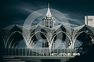 Railwaystation with skyscrapper in the background photo