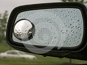 Rain on car mirror 20