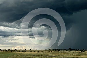 Rain cloud over Africa landscape