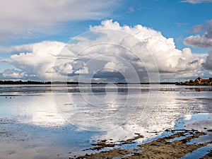 Rain clouds, cumulonimbus, over Gooimeer Lake near Huizen, Netherlands