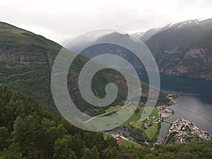 Rain clouds gather over a fjord in Norway