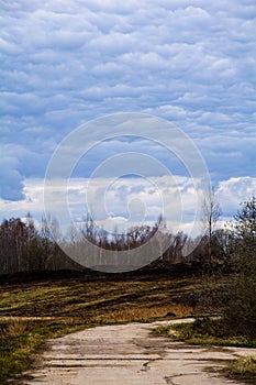 rain clouds over the field