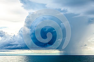 Rain Clouds at the Sea Horizon photo