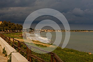 Rain clouds on the sea at the southeast coast of Sicily