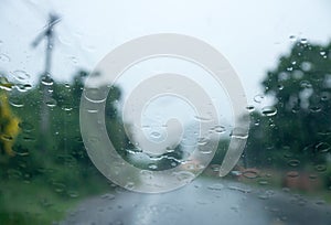 Rain drop on front auto glass