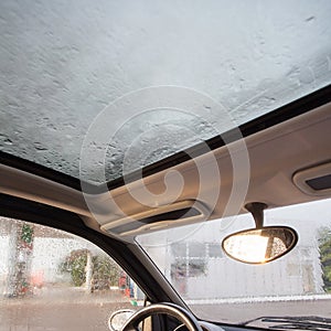 Rain droplets on car windshield