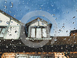 Rain droplets on glass window.