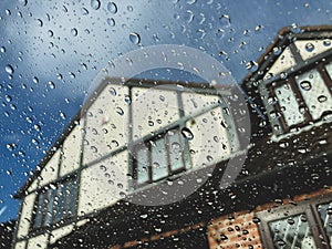 Rain droplets on glass window.