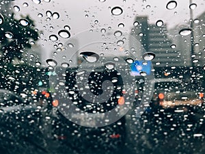 Rain drops on car front window