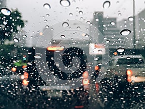 Rain drops on car front window