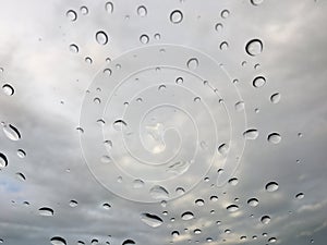 Rain drops on car front window