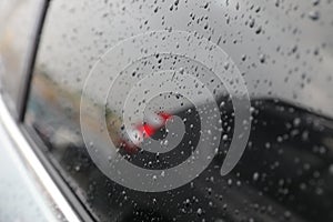 rain drops on car glass.