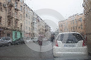 Rain drops on car glass. Rainy days, Evening. Rain drops on window, rainy weather,rain background