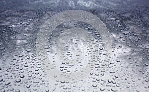 Rain drops on a car low