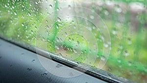 Rain drops on car window , rainy day