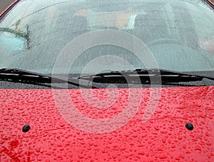 Rain drops on a car windshield