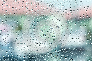 Rain drops on car windshield after rain