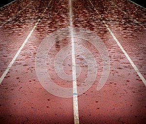 Rain Drops Falling on Race Running Track Delaying Competitions photo