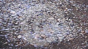 Rain drops flows down from home roof to the ground background