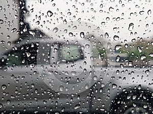 rain drops on glass traffic weather rainy season heavy rain