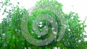 Rain drops on home glass window. Heavy rain outside, heavy rain, hurricane