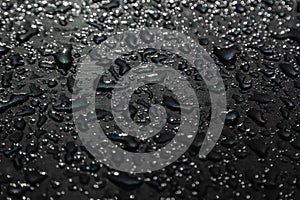 Rain drops on the surface of the car, abstract background