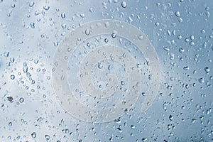 Rain drops water on glass window background