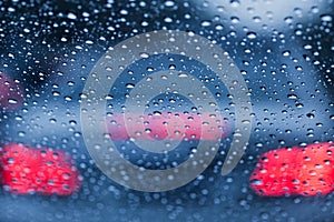 Rain drops wet raining season on windshield.