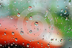 Rain drops on window in a rainy day