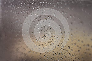 Rain drops on window. Rainy day. Bad weather background. Raindrops in glass surface. Water drops on car window. Water condensation