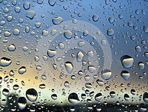 Rain drops on the window, sunset in background #2