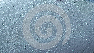 Rain drops on the windshield of the car