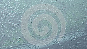 rain drops on the windshield of the car