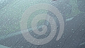 rain drops on the windshield of the car