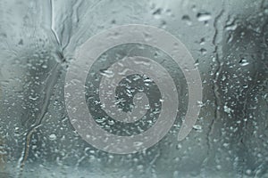 Rain drops on windshield glass