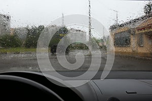 Rain drops on windshield, view from inside