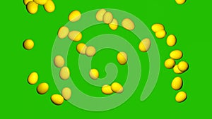 Rain of Easter yellow eggs on a chroma key background. Video for Easter.
