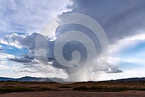 Rain falling from a storm cloud