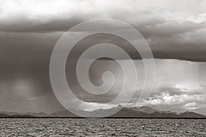 Rain falling over Lake Titicaca, Peru