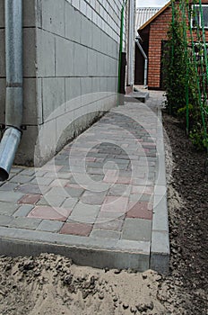 Rain flowing into a storm water sewer system