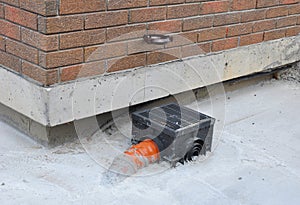 Rain gutter with new installed underground drainage system.