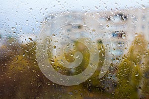 Rain outside the window, drops of rain on the windowpane