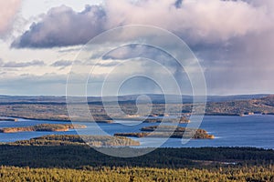 Rain over the beautiful  lake in autumn Lapland, Riisitunturi national park