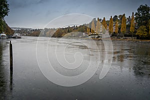 Rain over the rhin river with fall winter color